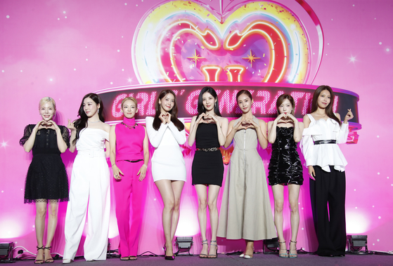 Girls' Generation poses during a press conference at Coex in southern Seoul on Friday to promote its upcoming full-length album ″Forever 1.″ [NEWS1]
