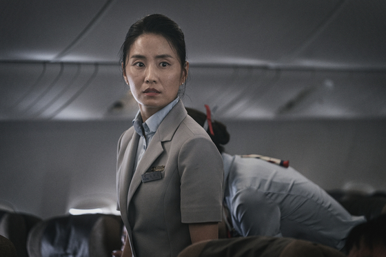Kim So-jin as Hee-jin, the chief flight attendant who cares for the passengers inflicted with the virus on the plane.[SHOWBOX]