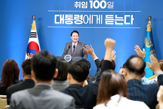 President Yoon Suk-yeol takes questions from reporters in a press conference to mark his 100th day in office at the Yongsan presidential office in central Seoul on Wednesday. [JOINT PRESS CORPS] 