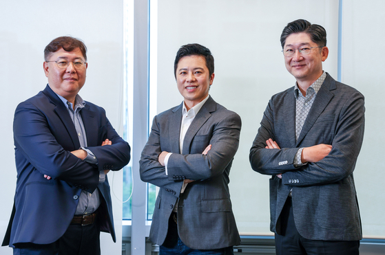 Executives from NPX Capital pose for photos during an interview with the JoongAng Ilbo at the JoongAng Ilbo building in Sangam-dong, western Seoul, on July 21. From left are: Kah Jong-hyun, chief operating officer of Terapin Studios; Samuel Hwang, CEO of NPX Capital; and Kim Do-young, chief legal officer of NPX Capital. [WOO SANG-JO]