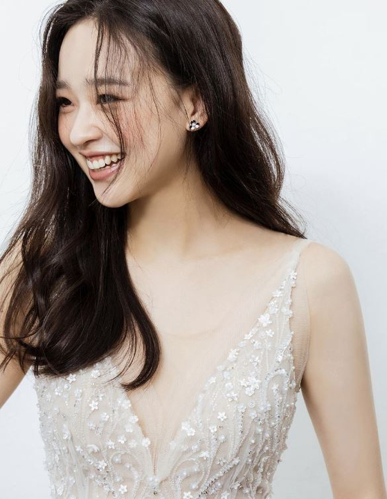 Retired gymnast Son Yeon-jae poses in a wedding dress during her wedding photo shoot, ahead of the ceremony on Aug. 21. The photo was released through Son's Instagram account on Aug. 19 [INSTAGRAM SCREEN CAPTURE]