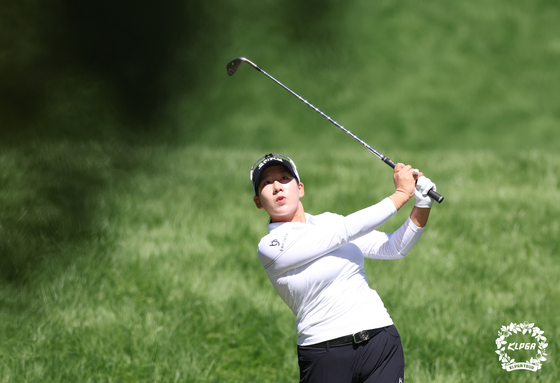 Hong Ji-won plays her iron on the third hole during the final round of the Hanwha Classic 2022 at Jade Palace Golf Club in Chuncheon, Gangwon on Sunday. [KLPGA]