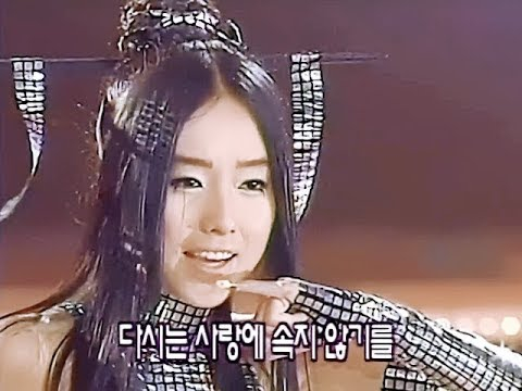 Lee Jung-hyun singing ″Wa″ (1999) on a local music program [SCREEN CAPTURE]