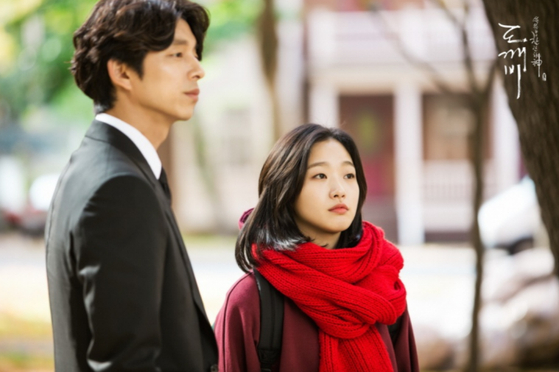 Actors Gong Yoo, left, and Kim Go-eun during a scene of tvN's ″Goblin: The Lonely and Great God″ (2016) [TVN]