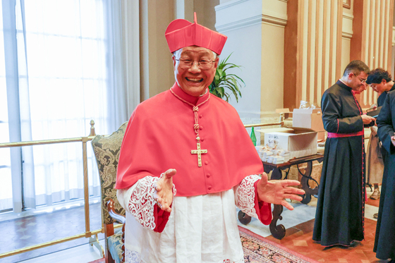 Korean Cardinal Lazzaro You Heung-sik poses at the end of the consistory ceremony in the Vatican on Saturday. Pope Francis named 20 new cardinals at his eighth Consistory. [EPA/YONHAP]