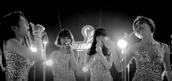 Mamamoo debuted with the song ″Mr. Ambiguous″ (2014) and its black-and-white music video, shown here. [SCREEN CAPTURE]