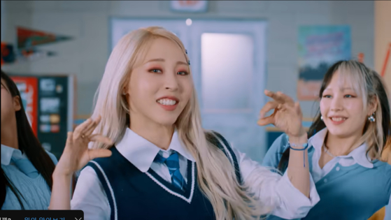Moonbyul in the music video for her solo song ″C.I.I.T (Cheese in the Trap)″ (2022) [SCREEN CAPTURE]