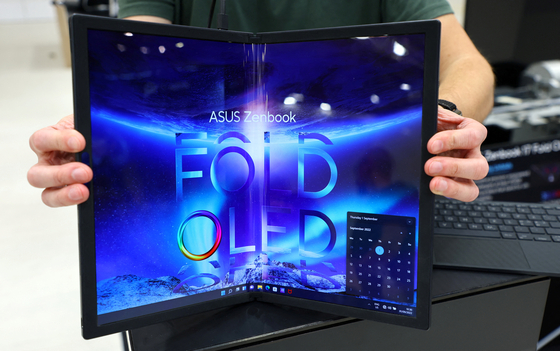 Asus' 17.3-inch foldable Zenbook 17 Fold OLED is shown at the IFA 2022 tech fair in Berlin, last Thursday. [REUTERS/YONHAP]