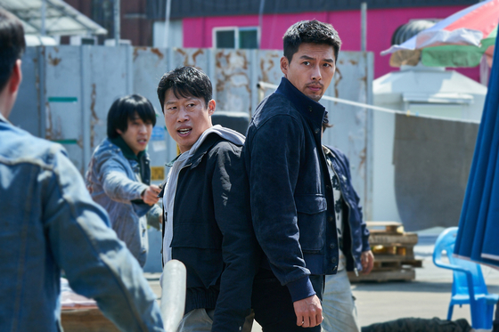 Actor Hyun Bin, on right, portrays the elite North Korean detective Im Cheol-ryung who visits South Korea again to work with the South Korean detective Jin-tae, left, portrayed by Yoo Hai-jin, to catch a North Korean criminal. [CJ ENM]