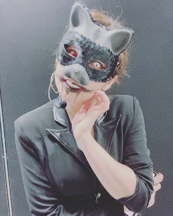 PinkFantasy member Daewang always appears wearing a rabbit or cat mask. She has kept her identity hidden since debuting. [SCREEN CAPTURE]