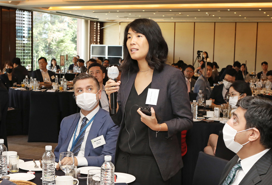Adeline Lise-Khov, head of the economic department of the French Embassy in Seoul, asks a question during the forum. [PARK SANG-MOON]
