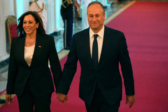 U.S. Vice President Kamala Harris and second gentleman Doug Emhoff are at the White House in Washington on Wednesday. Harris will visit Seoul later this month and meet with Korean President Yoon Suk-yeol. Emhoff led a U.S. delegation which attended Yoon's inauguration ceremony in May. [AFP/YONHAP]