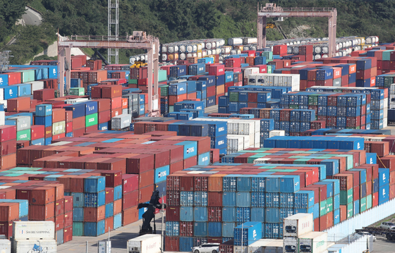 Containers are stacked at a port in Busan on Sept. 9. [NEWS1]