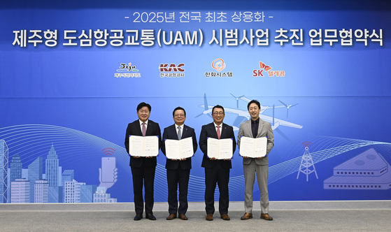 From left: Jeju Gov. Oh Young-hoon, Hanwha Systems CEO Eoh Sung-chul, SK Telecom CEO Ryu Young-sang and Korea Airports Corporation CEO Yoon Hyeong-jung [SK TELECOM]