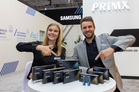 Models pose with PRiMX batteries at the IAA Transportation 2022 in Hannover, Germany [SAMSUNG SDI]