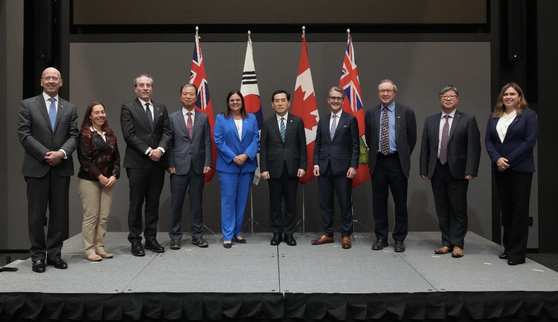 Representatives of the Canadian government, LG Energy Solution, Electra Battery Materials, Avalon Advanced Materials, and Snow Lake Lithium, pose for a photo after signing supply agreements in Toronto. [LG ENERGY SOLUTION]  