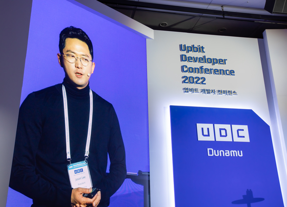 HYBE America President Jason Lee speaks at the Upbit Developer Conference in Busan on Friday. [DUNAMU]