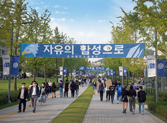 Decorations at Yonsei University's Sinchon campus in central Seoul show its offline Muak Festival is back for the first time in three years. The festival had been canceled due to the Covid-19 pandemic. [ALLAND DHARMAWAN]