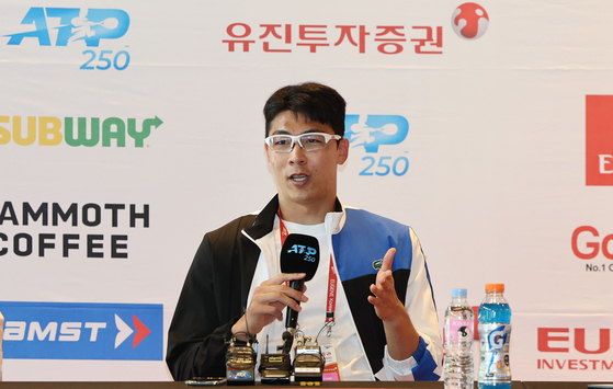 Chung Hyeon answers questions during a pre-match press conference for the 2022 Eugene Korea Open on Monday at Olympic Park Tennis Center in Songpa District, southern Seoul. [YONHAP]