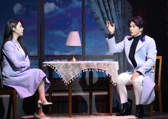 Actors Song Ju-hee, left, and Lee Yi-kyung as Seo Dan and Gu Seung-joon during a scene of the ongoing musical "Crash Landing On You" at COEX Shinhan Card Artium in Gangnam District, southern Seoul. [NEWS1]