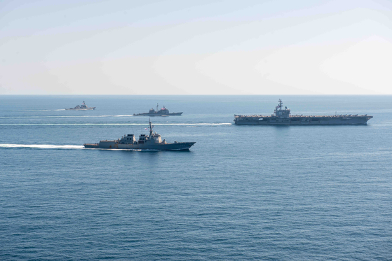 South Korean and U.S. naval vessels participate in a bilateral combined military exercise in the East Sea on Thursday. [YONHAP]