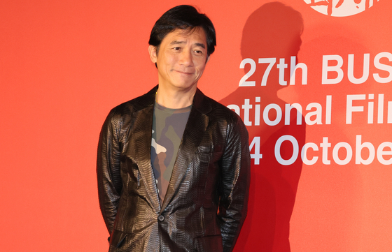 Hong Kong star Tony Leung Chiu-wai poses after the local press event at KNN Theater, Busan, on Thursday in celebration of his receiving of Asian Filmmaker of the Year award for this year's Busan International Film Festival. [ JOONGANG ILBO]