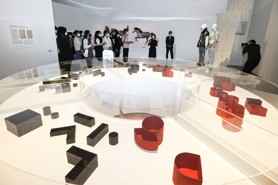 Local reporters look around the National Hangeul Museum's new exhibit “Reinterpreting Hangeul in the Modern Era" on Thursday, a day before its official opening. The exhibit showcases the outcome of the museum's annual Hangeul Design Project, which is in its fourth edition. [YONHAP]