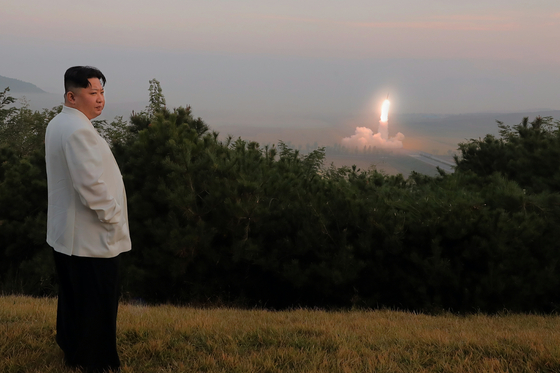 North Korean leader Kim Jong-un views a recent missile test at an undisclosed location and date in this photograph released by Pyongyang's state-controlled Korean Central News Agency (KCNA). [YONHAP]