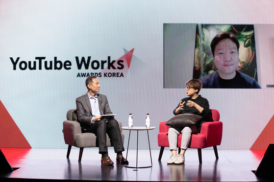 From left: Kim Kyoung-hoon, Google Korea country director; Kim Jung-ah, chief creative officer at Innocean; and Park Hyun-woo, Innored CEO, on screen, during a press conference held Tuesday in eastern Seoul [YOUTUBE KOREA]