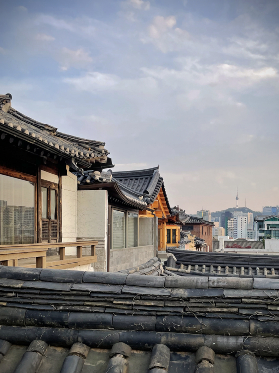 N-Seoul Tower, the second highest point in Seoul, seen from Bukchon Hanok Village [ALLAND DHARMAWAN]