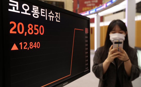 Kolon TissueGene surged 30 percent Tuesday morning, the first day it resumed trading in three years and five months. [NEWS1]