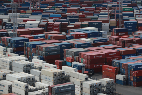 Containers stacked at a dock in the Port of Busan on Oct. 21 [YONHAP] 