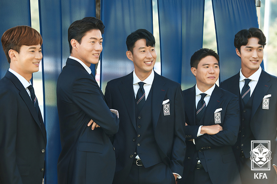 From left: Korean national team players Kim Jin-su, Hwang Ui-jo, Son Heung-min, Kwon Chang-hoon and Kim Dong-jun pose for a picture in their national team suits during a photo shoot in September. The suits were made by local brand Cambridge Members and will be worn at the upcoming 2022 World Cup. The suits were revealed on Thursday. [KOREA FOOTBALL ASSOCIATION]