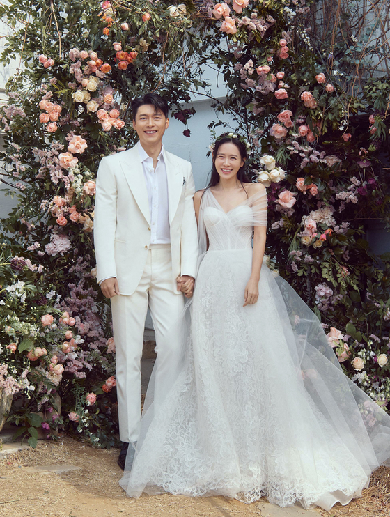 A wedding photo of Hyun Bin, left, and Son Ye-jin. The actor couple got married in March 2022. [VAST ENTERTAINMENT]