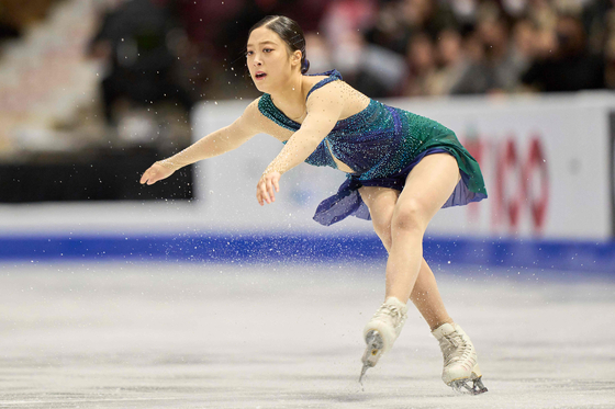You Young lands a jump during her free skate program at the Skate Canada International in Mississauga, Ontario on Saturday. You went on to win the women's figure skating bronze medal on Saturday. You was the only Korean to compete at the event. [AFP/YONHAP]