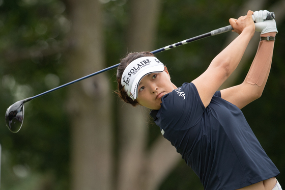Ko Jin-young tees off during the first round of the CP Women's Open wearing a bandage around her left wrist on Aug 25 in Ottawa, Canada. [USA TODAY/YONHAP]