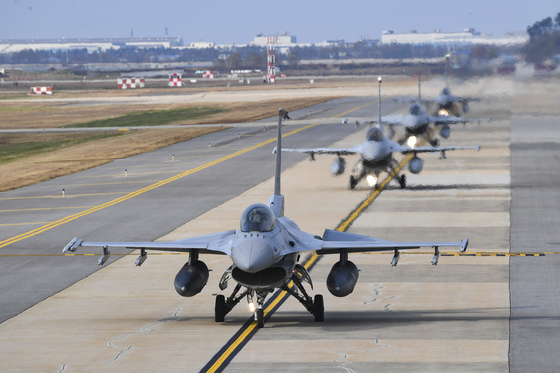 KF-16 fighters from the South Korean Air Force prepare to take off from Kunsan Air Base in Gunsan, North Jeolla on Tuesday. [REPUBLIC OF KOREA AIR FORCE]