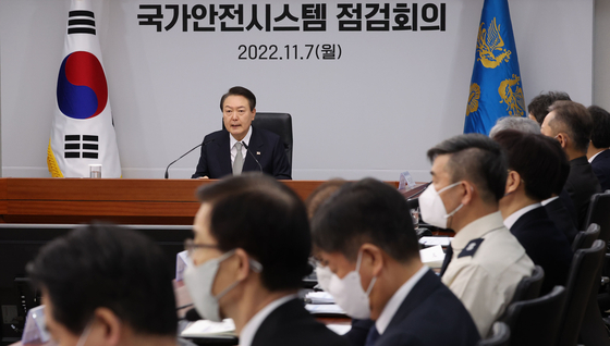 President Yoon Suk-yeol speaks in a meeting reviewing national safety regulations at the presidential office in Yongsan district, central Seoul, Monday, in the aftermath of the Itaewon tragedy. [JOINT PRESS CORPS]