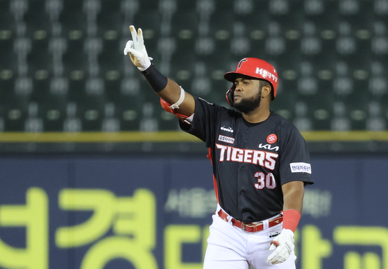 Socrates Brito of the Kia Tigers celebrates after picking up a two-run knock in a game against the LG Twins at Jamsil Baseball Stadium in southern Seoul on Oct. 4.  [YONHAP]