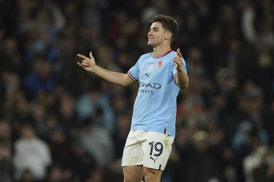 Manchester City's Julian Alvarez celebrates after scoring his side's second goal during a Carabao Cup third round match against Chelsea at Etihad Stadium in Manchester on Nov. 9.  [AP/YONHAP]