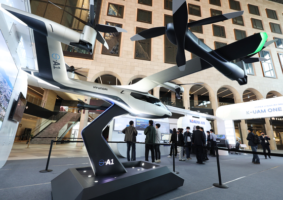 A concept model of Hyundai Motor’s private aerial vehicle S-A1 is displayed at Paradise City Hotel on Yeongjong Island in Incheon at the urban air mobility exhibition 2022 K-UAM Confex on Thursday. Incheon's city government has been promoting UAM development and it held the first K-UAM Confex last year. [YONHAP]