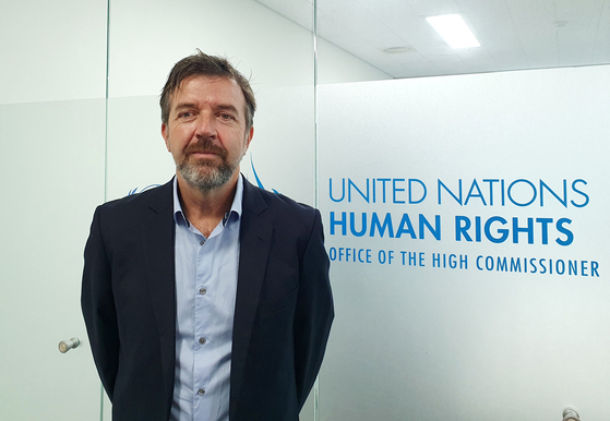 James Heenan, representative of the U.N. Human Rights Office, stands for a photo in front of the UN human rights agency's office in Jongno District, central Seoul on Thursday. [YONHAP]