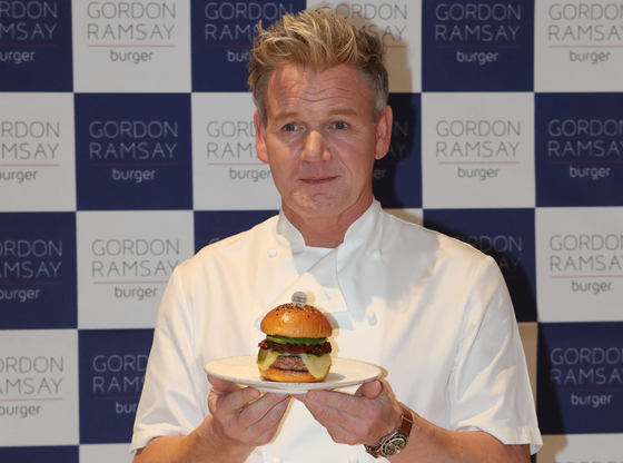Gordon Ramsay poses for a photo during a press conference at Gordon Ramsay Burger in Lotte World Mall in Songpa District, southern Seoul, on Thursday. [NEWS1]