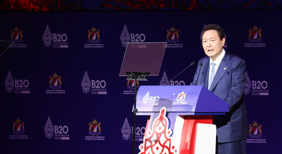 President Yoon Suk-yeol delivers a speech at the B20 summit at the Bali Nusa Dua Convention Center in Indonesia on Monday, ahead of the G20 summit Tuesday. [YONHAP]
