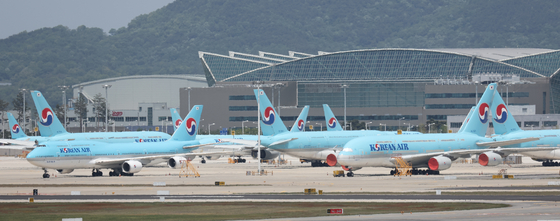 Korean Air Lines' planes are stationed at Incheon International Airport [YONHAP]