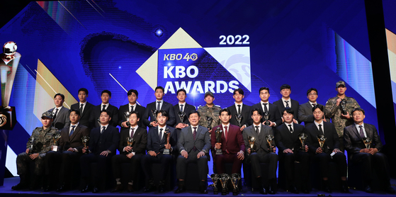 The awardees at the 2022 KBO Awards pose with their awards on the stage at The Westin Josun Seoul in central Seoul on Thursday.  [NEWS1]