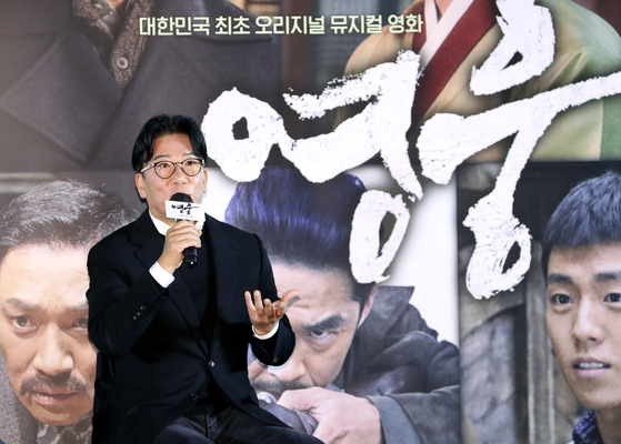 Director Yoon Je-kyun speaks at a local press event to promote their film “Hero” at Yongsan I’Park Mall branch of CGV in central Seoul on Monday. [NEWS1]