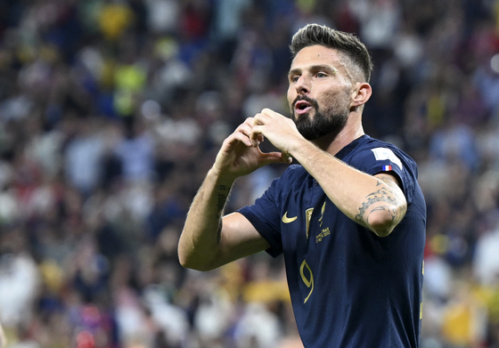Olivier Giroud of France celebrates his goal during a Group D match against Australia at Qatar World Cup at Al Janoub Stadium in Al Wakrah, Qatar on Tuesday.  [XINHUA/YONHAP]