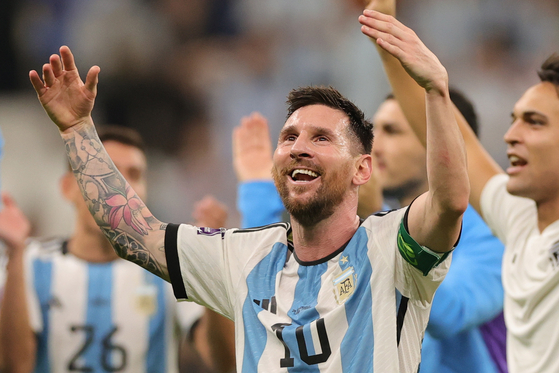 Argentina's Lionel Messi celebrates after scoring his side's opening goal during the World Cup group C match between Argentina and Mexico, at the Lusail Stadium in Lusail, Qatar, on Saturday. [EPA/YONHAP]