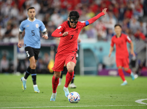 Son Heung-min in action during a 2022 Qatar World Cup Group H match against Uruguay at Education City Stadium, Al Rayyan, Qatar on Thursday. [REUTERS/YONHAP]